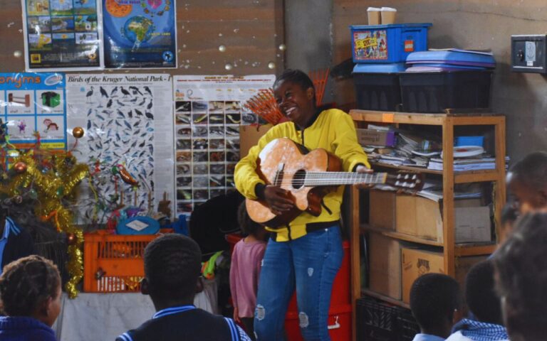 Billie - Green Kidz facilitator, sharing a warm welcome singing 'Loliwe' by Zahara